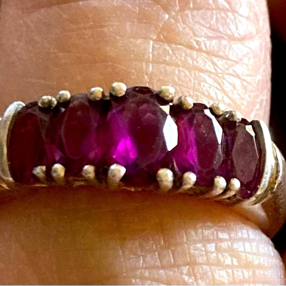 925 silver ring with beautiful purple stones.